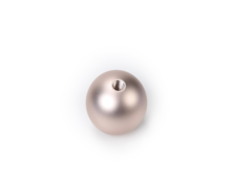 Aluminum CNC machined ball with rose gold anodizing